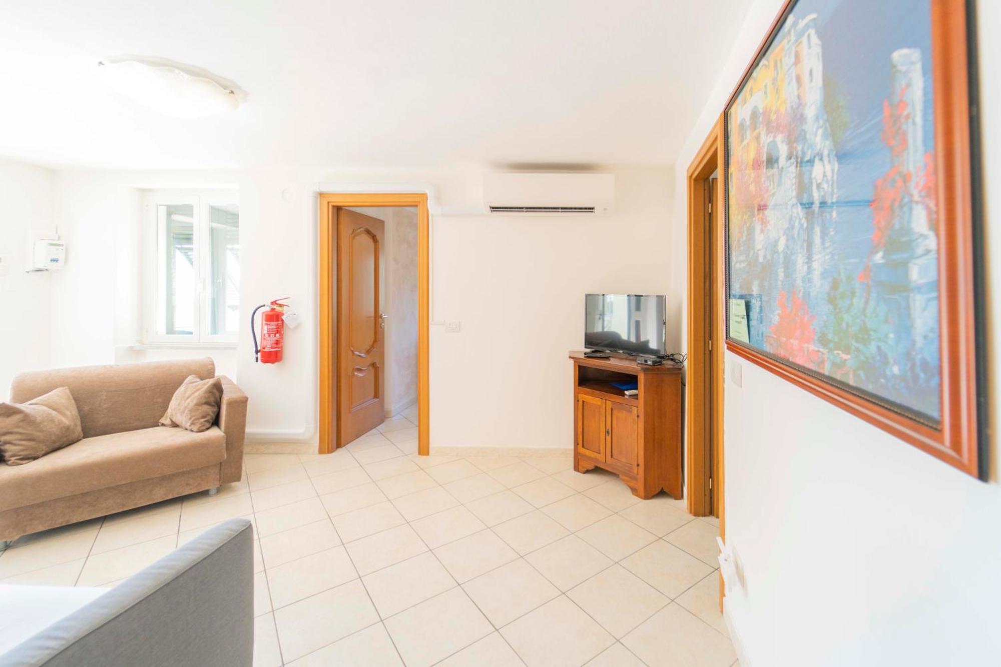 Casa Vacanza Il Portico Монелья Номер фото